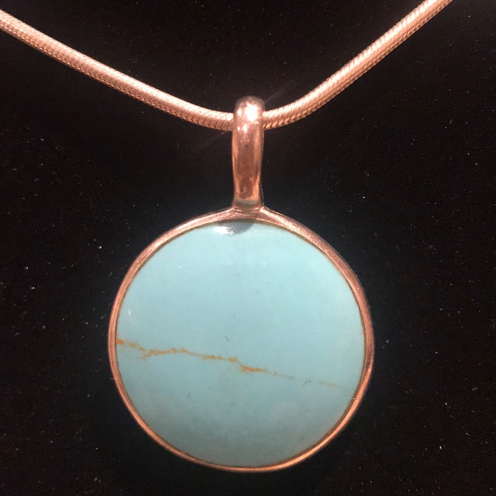 Sterling silver and turquoise pendant only.